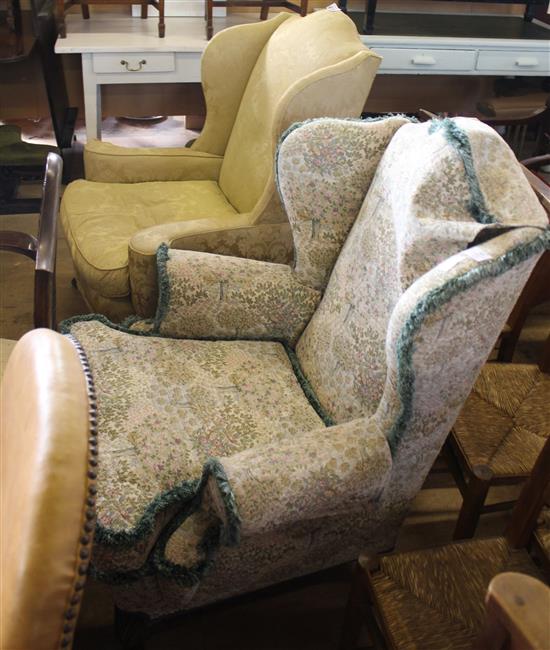 2 upholstered wingback armchairs